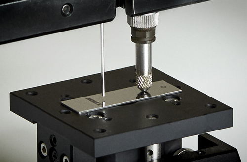 Fiber-optic probe compared to tactile stylus